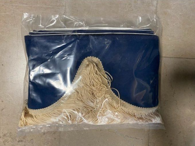 Frange gamme hollandaise bleu fil beige stock